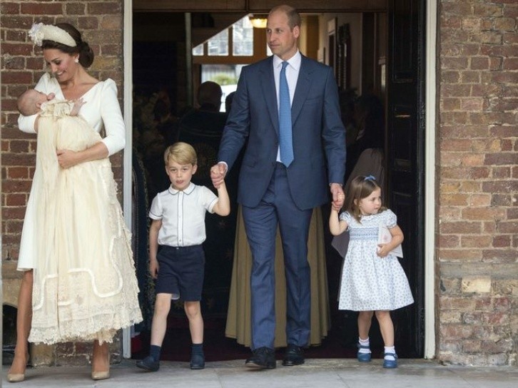 The Duchess of Cambridge, husband and children at the christening of little Loius. Photo.AP