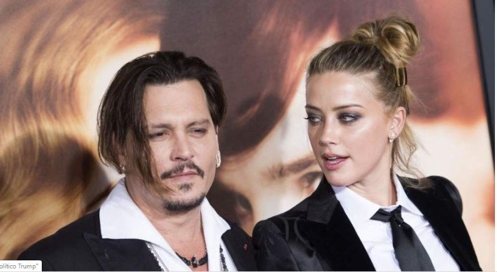 Johnny and Amber. AFP